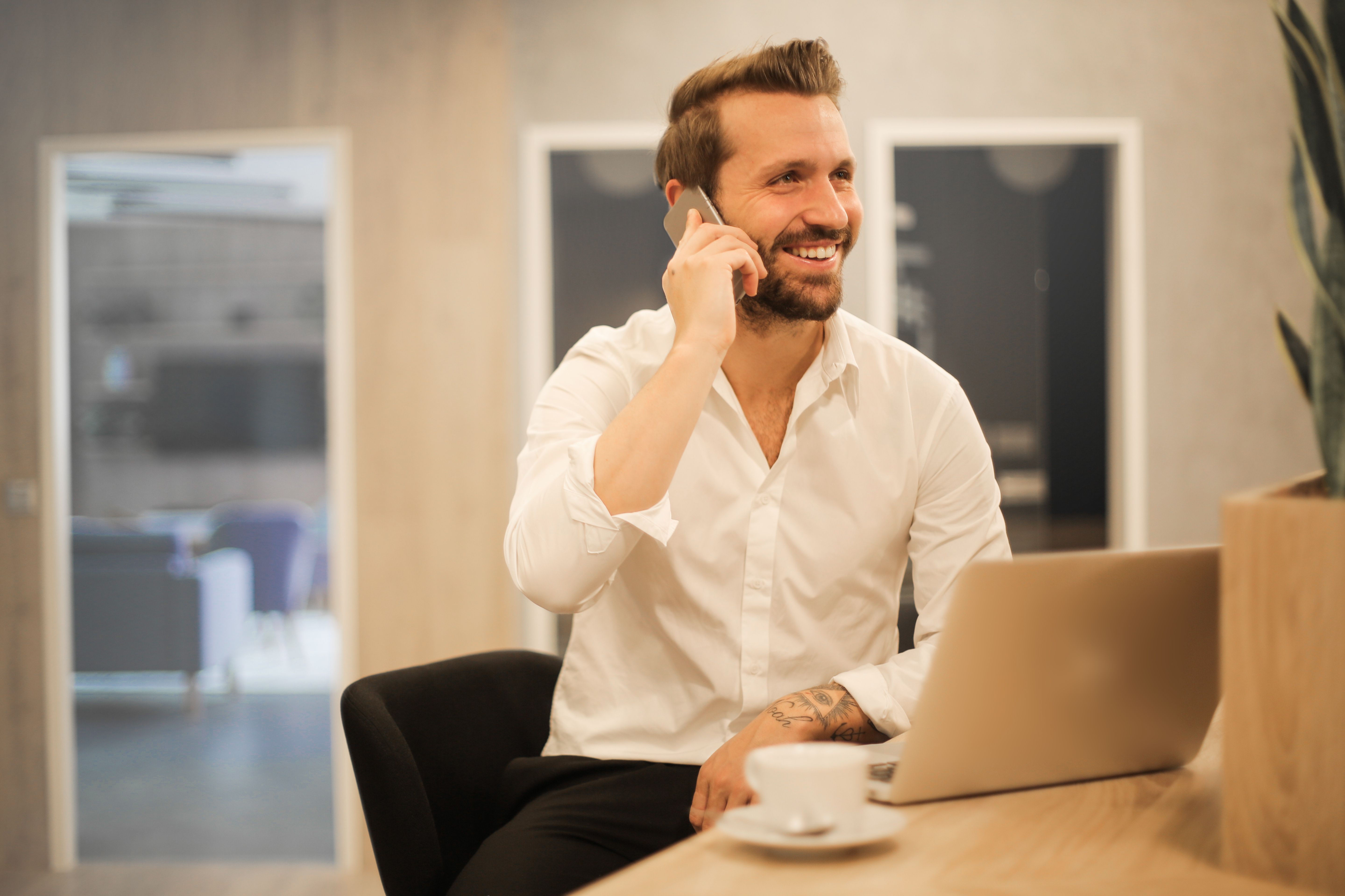 Employee smiling while on the phone